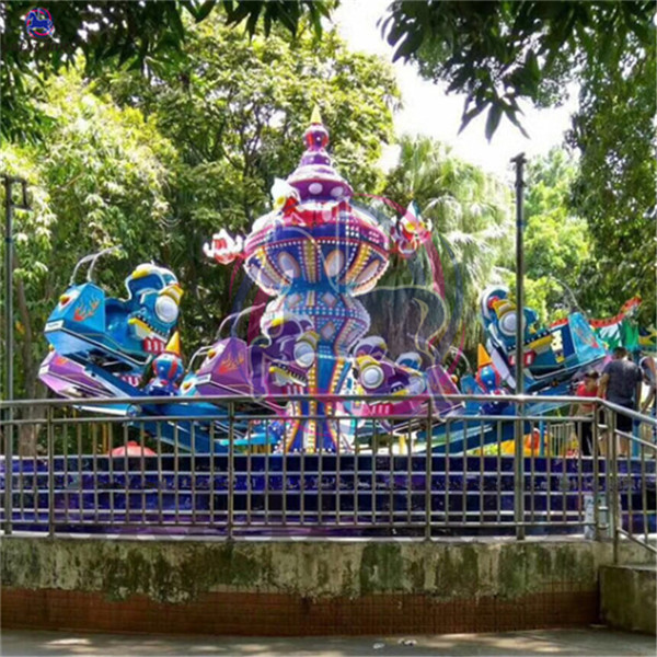 Funfair rides adult amusement games FRP material rotating crazy dance robocop for sale