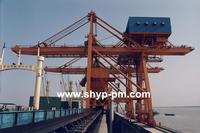 Bridge-type grab ship unloader