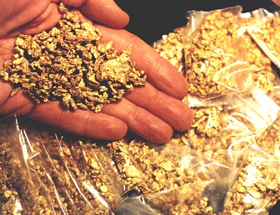 Gold nuggets and bars available for sale -