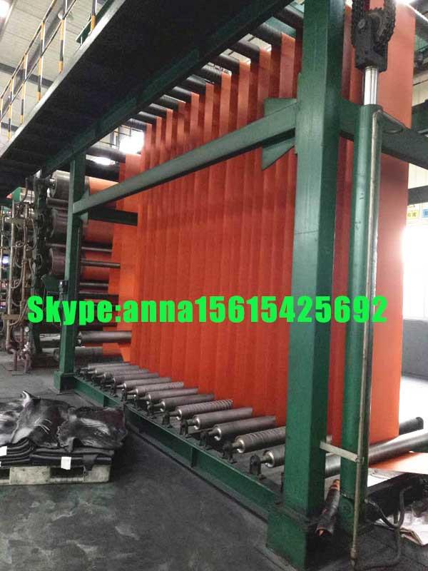 Raised edge conveyor belt