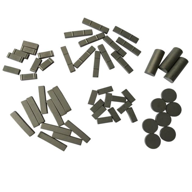 Tungsten carbide tips for oilfield stabilizers