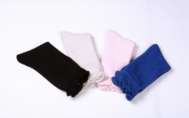 Women's breathable pointelle crew socks with ruffle edge