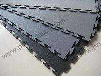 Plastic interlocking floor tile 