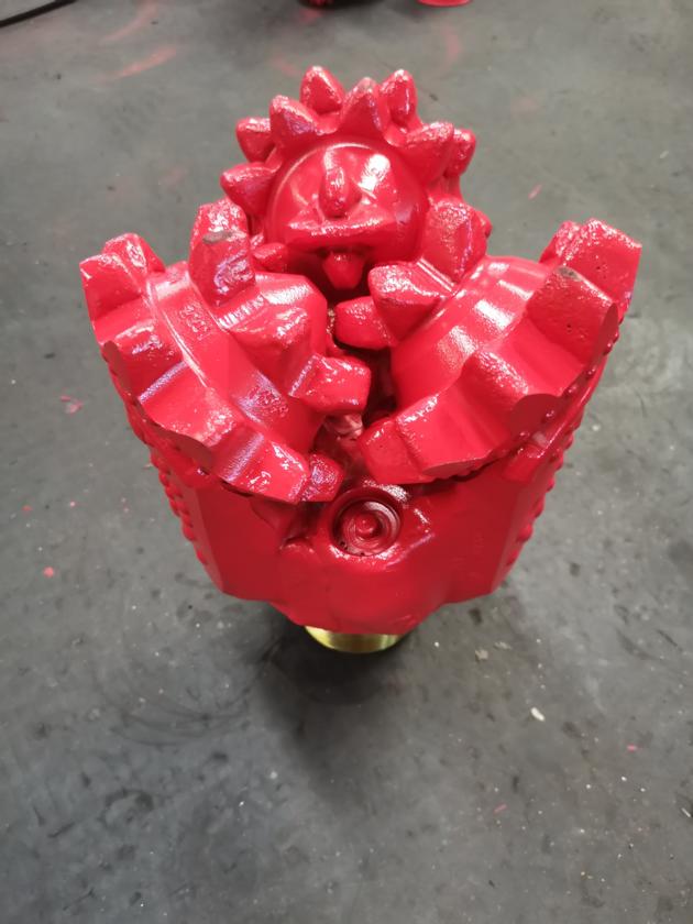 Steel tooth rock bit