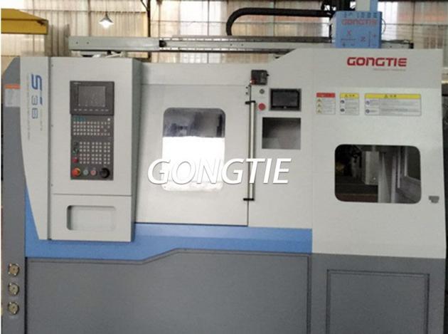CNC lathe with station rotary stocker