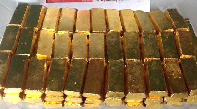 Gold Dore bars, and diamonds