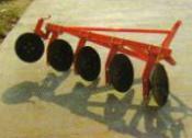 Disc plough with tractor