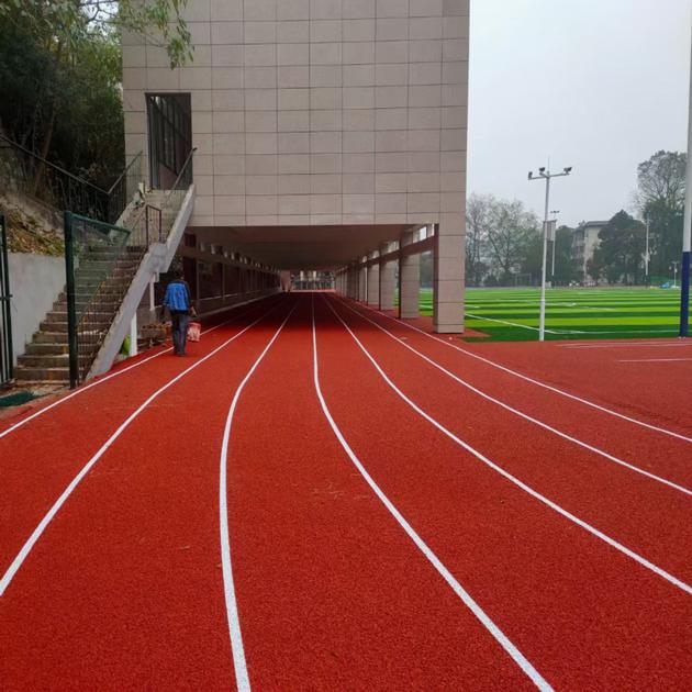 Running track Spray coat 