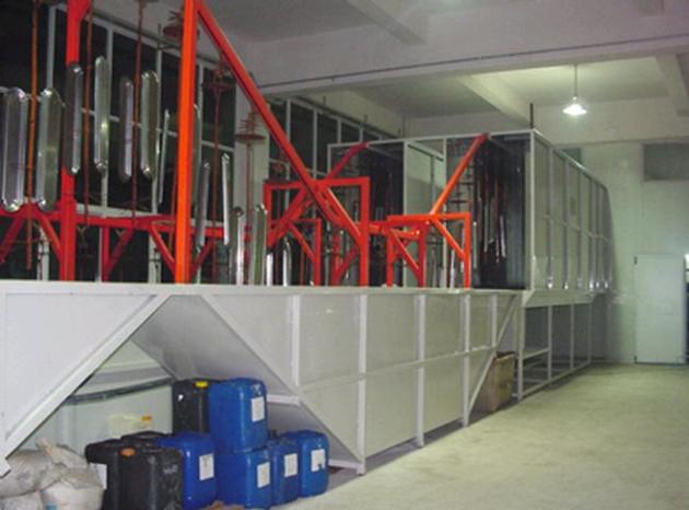 Generator powder coating line with chemical dipping pretreatment tanks