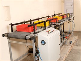 FLAME TREATMENT CONVEYOR