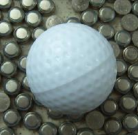 Golf gift: compressed towel in golf ball shape