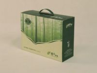 Plastic handle corrugated box