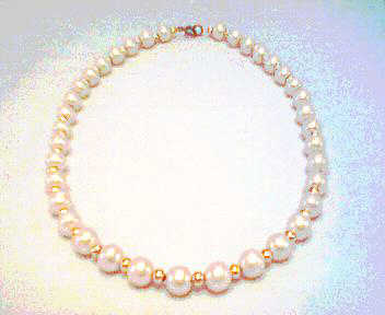 White  Pearls and Golden Accessories Necklace