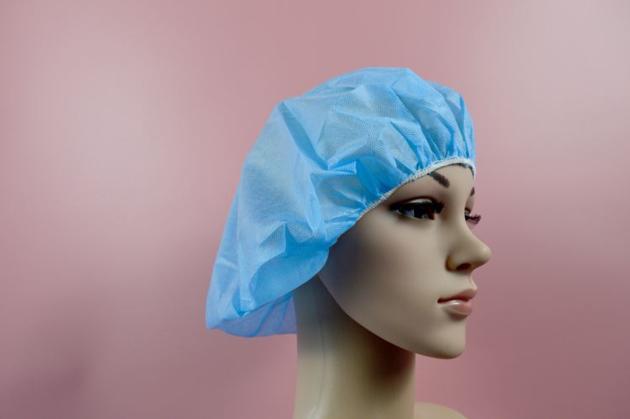 Disposable non-woven strip cap