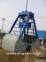 Hand dumping clamshell grab