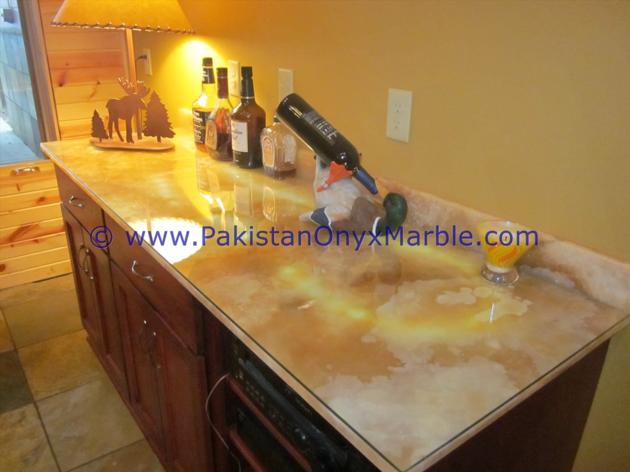 BACKLIT ONYX COUNTERTOPS FOR BAR RECEPTIONS