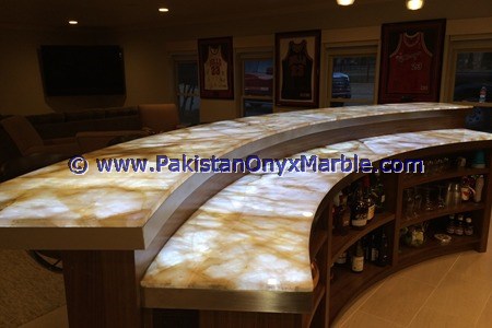 BACKLIT ONYX COUNTERTOPS FOR BAR RECEPTIONS