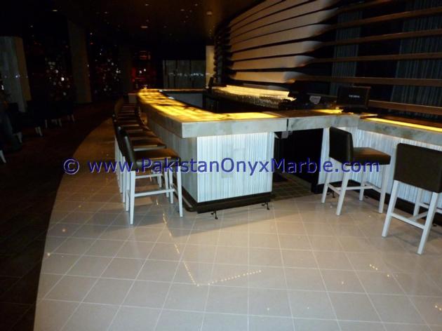 BACKLIT ONYX COUNTERTOPS FOR BAR RECEPTIONS