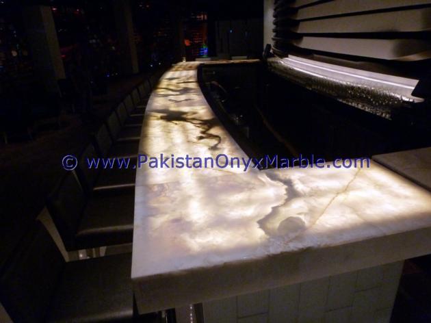 BACKLIT ONYX COUNTERTOPS FOR BAR RECEPTIONS