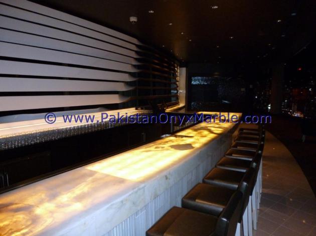 BACKLIT ONYX COUNTERTOPS FOR BAR RECEPTIONS