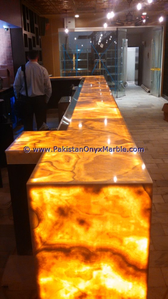 BACKLIT ONYX COUNTERTOPS FOR BAR RECEPTIONS