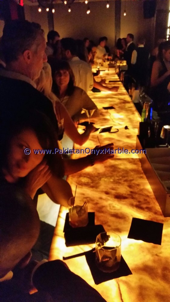 BACKLIT ONYX COUNTERTOPS FOR BAR RECEPTIONS