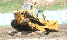 Tractor for land reclamation jobs with dozer and ripping equipment CHETRA 11M