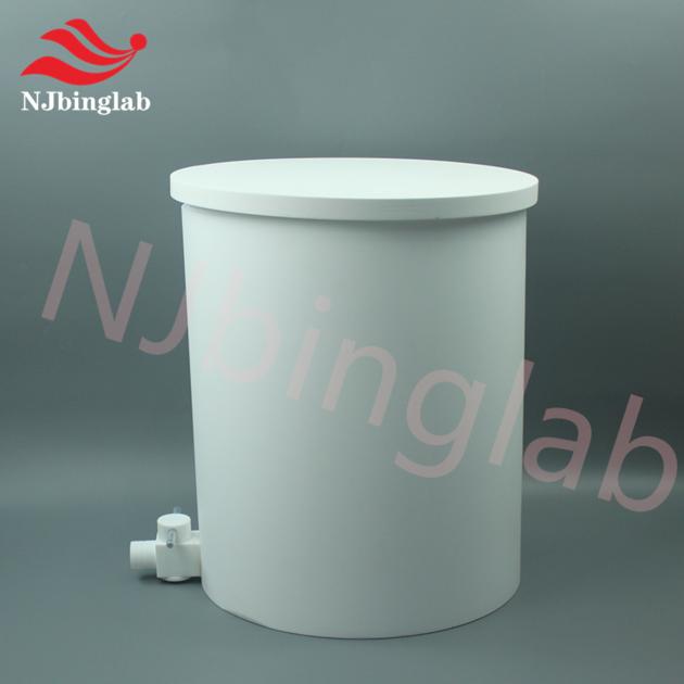 Teflon laboratory barrel with lower port valve for easy drainage