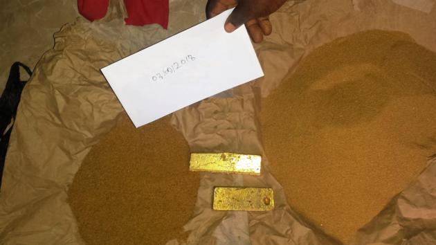 gold bar and gold dust