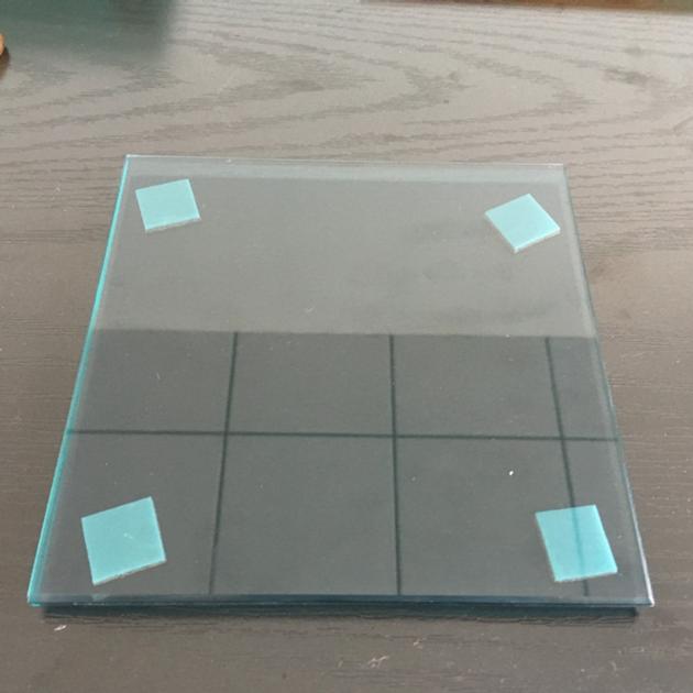 Colored laminated glass skylights provide safe shade