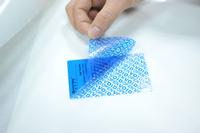 Total transfer low-residue tamper evident labels