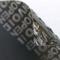 Tamper evident labels and tamper evident seals