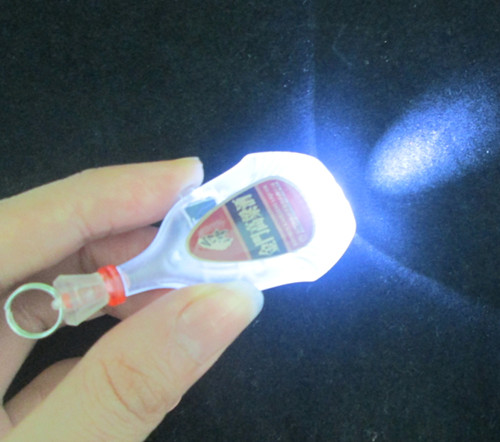 ABS high quality OEM led bottle keychain projector logo bottle keychain