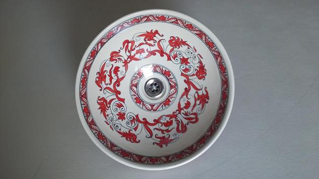 Red carnival porcelain wash basin. 