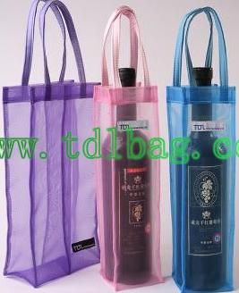 Mesh wine bottle