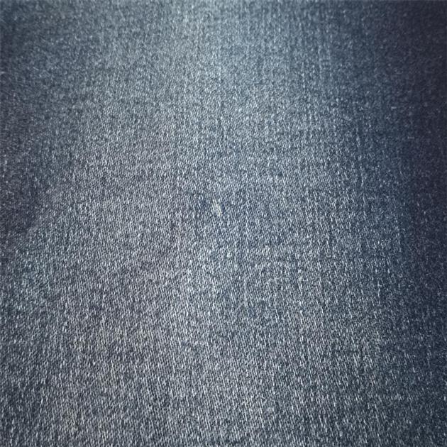 Blue colored combed stretch denim fabric