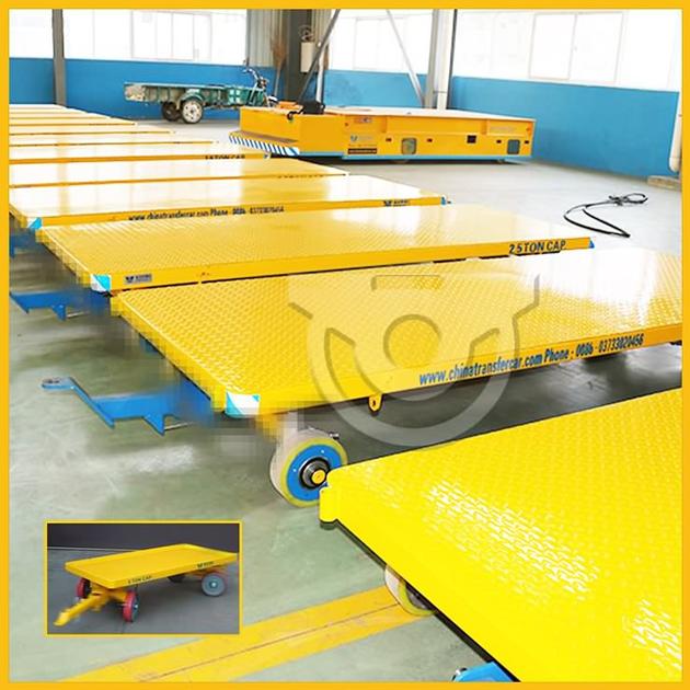 Non-power trailer with audible warning device for shipyard transportationg on cement floor