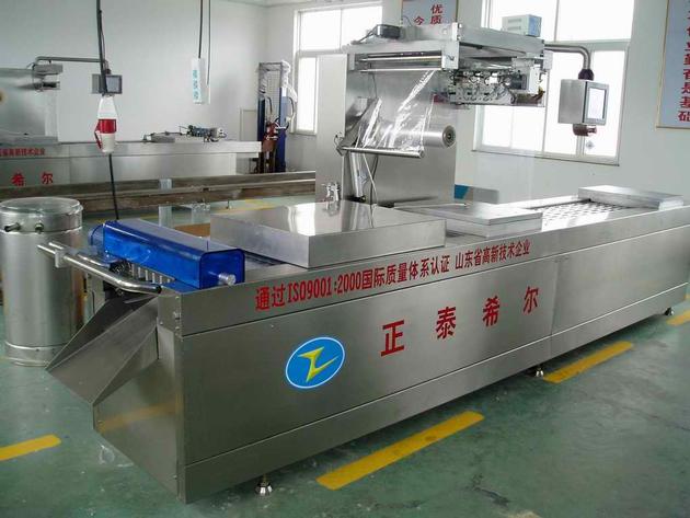 Automatic vacuum packing machine