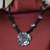 grey shell necklace