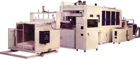 AUTOMATIC HIGH SPEED VACUUM FORMING MACHINE