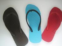 Lady Massaging Bumps Rubber Slippers