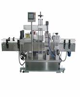 The vertical fixed multi-function oil bottles labeling machine